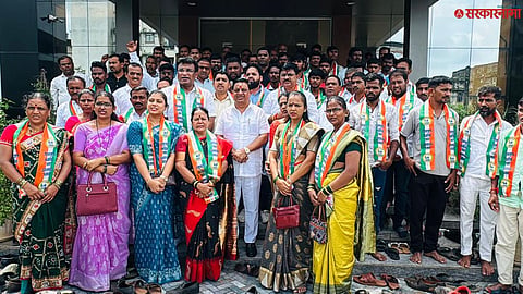 BJP workers join NCP Sharad Pawar faction under the leadership of MP Suresh Mhatre.