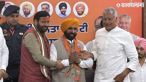 Gyan Singh Mann joins the BJP in the presence of Nayab Singh Saini and Sunil Jakhar during a political event.