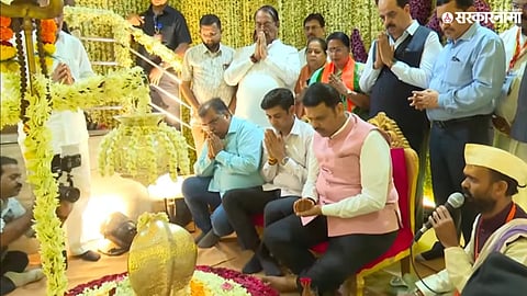 Devendra Fadnavis addresses devotees and dignitaries during the Shri Pimpaleshwar Mahadev Temple ceremony, highlighting the significance of Sanatan Dharma and cultural heritage.