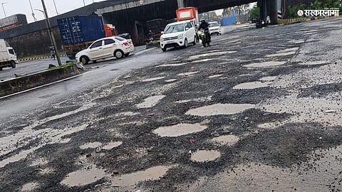 BJP leaders protest over dangerous potholes on Thane's Ghodbunder Road, demanding criminal action against the Mayor and Municipal Commissioner.