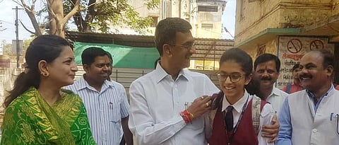 minister shambhuraj desai reached examination center with daughter