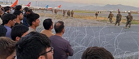 panic at kabul airport after threat of isis attack