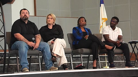 Left to right: Leslie and Daniel Skaggs; Teresa Bunche of the Arkansas Division of Children and Family Services; and Daniel Ibinola
