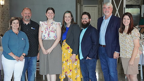 Members of the 100 Families Initiative team 