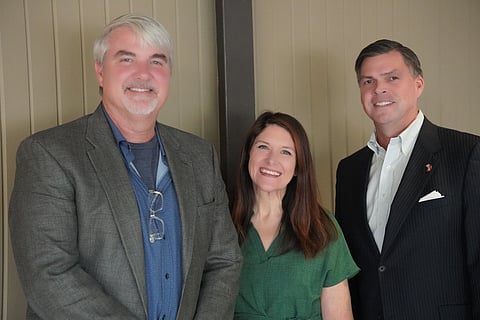 Paul Chapman and Karen Phillips of Restore Hope and Mark Conine of the Arkansas Development Finance Authority