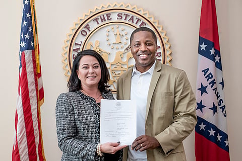 Kevin Hunt takes the oath of office to become a board member of the Arkansas Coalition for Juvenile Justice