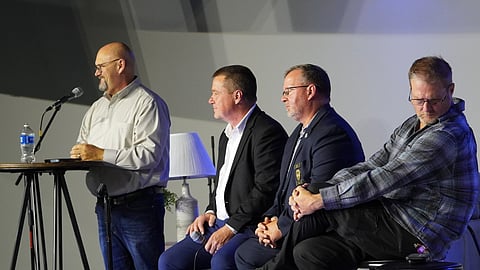 A panel of local leaders in Russellville in Pope County talks to out-of-state guests from Casey Family Programs about what HopeHub has done for their community. From left to right: 100 Families Initiative Community Success Manager Jeff Piker, Mayor Fred Teague, Police Chief David Ewing, and Journey Church Lead Pastor Steve Pyle.