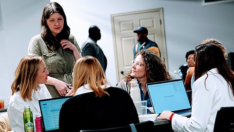 Heather Edwards (top left) trains leaders from Iowa on how to use the Restore Hope model to move people from crisis to stability and on to career. 