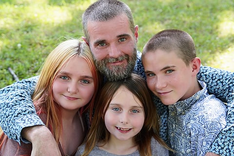 Morris and his three children