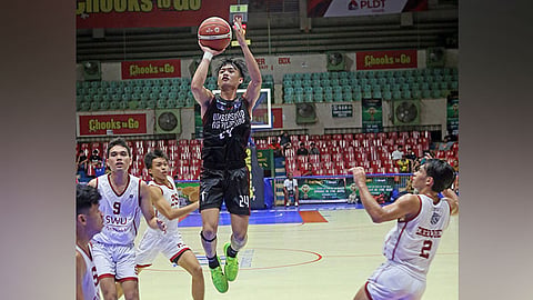 HISTORIC WIN. JZ Dizon and the rest of the UP Cebu Fighting Maroons logged their first-ever win in the Cesafi, beating SWU-Phinma, 53-50, on Sunday night, Oct. 15, 2023 at the Cebu Coliseum. / SUGBUANONG KODAKER
