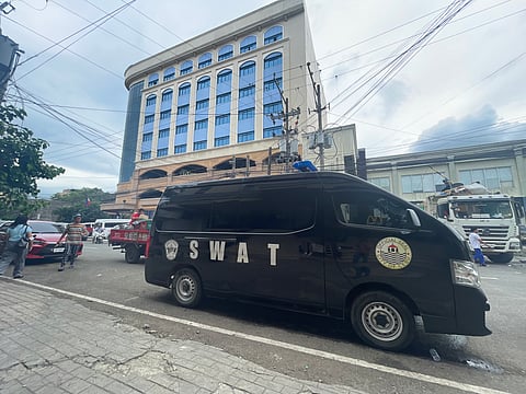 Downtown sighting. A Special Weapons and Tactics (Swat) vehicle is parked across the Metropolitan Cebu Water District (MCWD) building in downtown Cebu City Tuesday afternoon, Nov. 7, 2023, while the new board of directors led by chairman Melquiades Feliciano, a retired miitary general, is meeting inside. Jose Daluz III, the MCWD chairman who refuses to vacate his post, says they will make an effort “not to allow them to use any facilities of MCWD.” Daluz is referring to Feliciano,  lawyer Aristotle Batuhan and businessman Nelson Yuvallos, whom Cebu City Mayor Michael Rama appointed last Oct. 31 to replace him, Miguelito Pato and Jodelyn May Seno in the board. Feliciano says the Cebu City Legal Office sent the Swat team. 