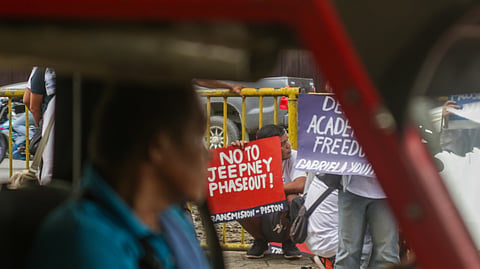 'NO TO JEEPNEY PHASEOUT'. A member of Transmision-Piston calls for a continuation of jeepney operation during the Bonifacio Day rally at Freedom Park, along Roxas Ave., Poblacion District, Davao City, on Thursday, Nov. 30, 2023. 