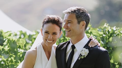 JUST MARRIED! In this image supplied by Dame Jacinda Ardern and Clarke Gayford, former New Zealand Prime Minister Jacinda Ardern embraces her husband Clarke Gayford at their wedding in Havelock North, New Zealand, Saturday, Jan. 13, 2024. After almost five years of engagement and a postponement due to the coronavirus pandemic, Ardern has married longtime partner Gayford in a private ceremony at a central North Island winery. 