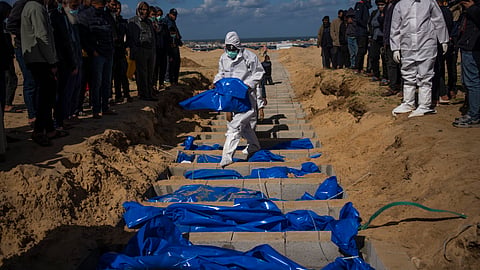 PALESTINIANS bury the bodies of people who were killed in fighting with Israel and returned to Gaza by the Israeli military, during a mass funeral in Rafah, Gaza Strip, Tuesday, Jan. 30, 2024.   