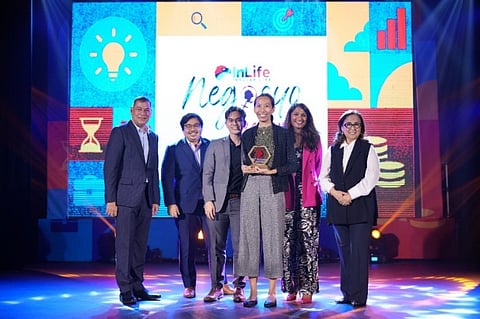 InLife President and CEO Raoul Littaua (leftmost) and Executive Chairperson Nina Aguas (rightmost) present the InLife Negosyo Challenge Runner-Up Award to Czar Carbonell (fourth from left), CEO of start-up Magwai.
