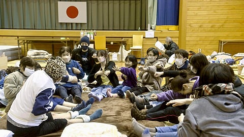 LOCAL residents in the quake-hit area stretch out together at a shelter in Anamizu, Ishikawa prefecture, Sunday, Jan. 7, 2024. /  KYODO NEWS VIA AP