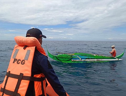 ZAMBOANGA. The Philippine Coast Guard (PCG) has launched search operations to locate the four missing crew of a fishing boat that sank near the island village of Tumalutab, Zamboanga City on Thursday, February 1. A photo handout shows a PCG personnel talking to a fisherman while conducting search operations.