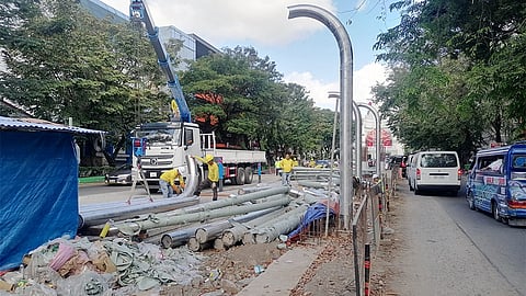 CEBU. Workers assemble the roof or shed for the BRT bus station at Capitol Area in Cebu City on January 24, 2024.