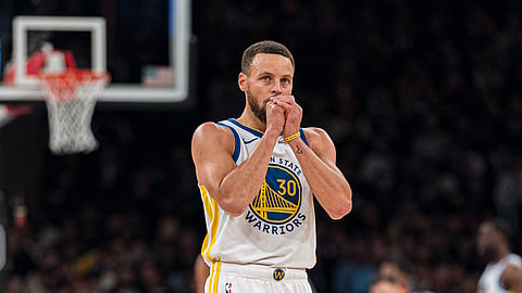 Golden State Warriors guard Stephen Curry stands on the court during the first half of the team's NBA basketball game against the New York Knicks in New York, Thursday, Feb. 29, 2024.