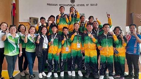 HAIL THE CHAMPS. The Davao City wushu team has retained its overall championship by clinching four gold medals, three bronzes, and one silver at the close of the Davao Region Athletic Association (Davraa) Meet 2024 secondary wushu sanda competition at the Precious International School of Davao (PISD) gym in Matina on Thursday afternoon, April 4.