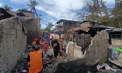 The aftermath of the fire that razed several houses in Purok 26, Muslim Village, Times Beach, Barangay 76-A, Bucana, Davao City on Monday morning, April 8.