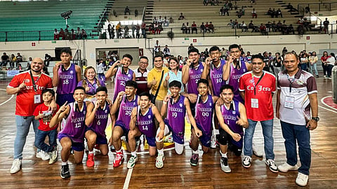 CHAMPS AT LAST. The Digos City Trekkers celebrate their gold medal win after an eight-year pursuit by dethroning perennial champion Davao City Durians, 72-69, in the secondary boys basketball finale showdown in the Davao Region Athletic Association (Davraa) Meet 2024 on Saturday morning, April 6, at the Holy Cross of Davao College gym.


