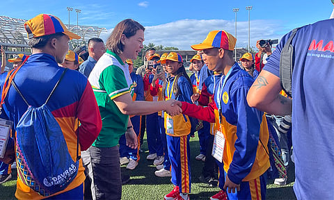 Vice President and Education Secretary Sara Duterte mingles with the delegates of the 2024 Davao Regional Athletic Association (Davraa) during the meet’s opening on Monday afternoon, April 1, at the University of the Philippines-Mindanao (UPMin) Sports Complex, Mintal, Davao City. Duterte reminded the delegates not to be afraid to ask for a timeout whenever necessary, especially since the temperature is not athletes-friendly these days.