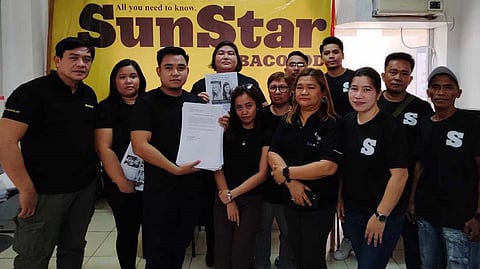 Anthony Onrejas (left), SunStar Management head of SunStar Publishing, Inc., with the SunStar Bacolod team on Tuesday, April 16.
