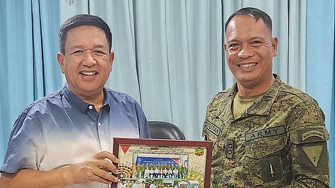 ZAMBOANGA. The Philippine Army is transferring the 64th Infantry Battalion from Sumisip, Basilan province of Guipos, Zamboanga del Sur. A photo handout shows Basilan Governor Hadjiman Hataman-Salliman handing over a memento as a sign of gratitude to Lieutenant Colonel Abel Potutan, 64IB commander, in an exit call to him by the military official at the provincial capitol on Tuesday, April 2. 