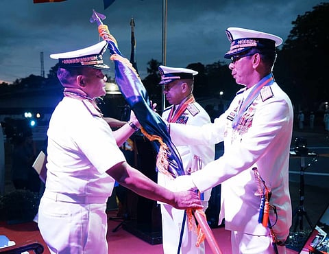 ZAMBOANGA. The Philippine Navy (PN) installs a former defender of the West Philippine Sea as the new commander of the Naval Forces Western Mindanao (NFWM). A photo handout shows Vice Admiral Toribio Adaci, Jr., PN flag officer in command (left), presiding over the change of command ceremony as Rear Admiral Donn Anthony Miraflor (right) relinquished command of the NFWM to Commodore Francisco Tagamolila Jr. on Thursday, May 9. 