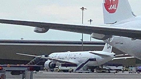 The Boeing 777-300ER aircraft of Singapore Airlines, flight SQ321 from Heathrow is seen on tarmac after requesting an emergency landing at Bangkok's Suvarnabhumi International airport, Thailand, Tuesday, May 21, 2024. 