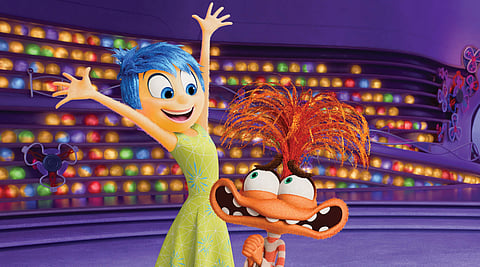 This image released by Disney/Pixar shows Joy, voiced by Amy Poehler, left, and Anxiety, voiced by Maya Hawke, in a scene from "Inside Out 2." 
