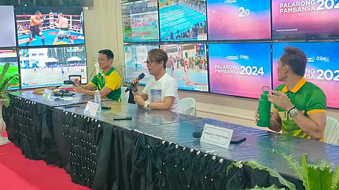 CEBU. Palarong Pambansa Secretary General Francis Cesar Bringas (center) answers questions during a press conference Tuesday, July 16, 2024.