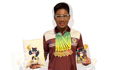 HISTORIC FINALE.   Paolo Miguel Labanon of Davao City caps his final Palarong Pambansa appearance with four gold medals, one silver, and two bronzes. He also shattered a nine-year-old record in the secondary boys' 800-meter freestyle at the Cebu City Sports Center on Sunday afternoon, July 14. 