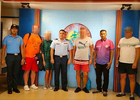 ZAMBOANGA. Philippine authorities rescue four Russians aboard a yacht in distress near San Miguel Island, locally Bangkawan, in Umus Mataha village, Mapun, Tawi-Tawi. A photo handout shows the four Russians posed for posterity pictorial after they were rescued on Tuesday, July 9. 