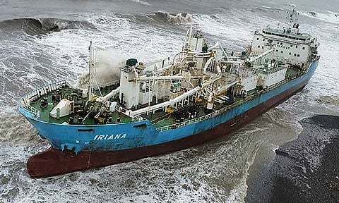 In this photo released on Friday, July 26, 2024 by the Pingtung County Government, the Indonesia cargo ship Iriana is seen beached in the aftermath of Typhoon Gaemi near the coast of Pingtung county in southern Taiwan. 