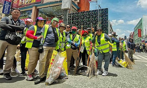 Personnel from the City Government of Davao who are in charge of cleaning the streets pose for a picture after the Parada Dabawenyo at San Pedro Square on San Pedro Street, Davao City, on  March 17, 2024.
