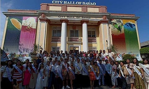 The 78 junior youth officials of the City Government of Davao take their oath of office during the flag-raising ceremony at the City Hall Drive, Monday morning, August 12, 2024.
