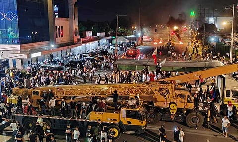 Hundreds of Kingdom of Jesus Christ (KOJC) members and supporters are holding a protest outside the KOJC compound following the entry of thousands of police to search for Pastor Apollo C. Quiboloy on Sunday, August 25, 2024. 