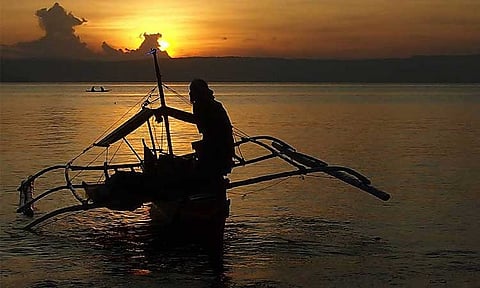 AS DAWN BREAKS. Fishermen are out to sea early to be able to bring home enough for a day’s subsistence before noon. Artisanal fishermen using small fishing boats cannot stay long and far at sea.