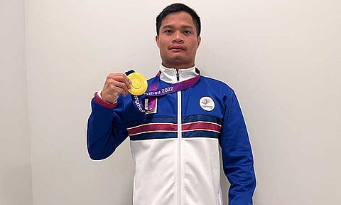 ASIAD GOLD. Ernie Gawilan proudly displays his gold medal from the men’s 400m freestyle - S7 at the 4th Asian Para Games in Hangzhou, China, last year.