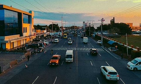CLEARING THE WAY. The last police barricades outside the KOJC Compound were removed on Wednesday, August 28, 2024, restoring full access to all six lanes of the Carlos P. Garcia National Highway in Buhangin, Davao City. Traffic now flows smoothly, offering much-needed relief to commuters. As the sun sets, this reopening fully of the highway marks a return-to-normal for drivers, easing congestion and ensuring a more efficient drive home. 