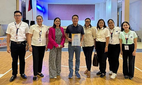 DTI Davao del Sur, led by Provincial Director Maria Victoria R. Placer (2nd from left), ceremonially confers the approved Lunsod Lunsad Project to Digos City Mayor Josef Fortich Cagas (4th from left) joined by City Councilor Liza Cagas (3rd from left) and Assistant City Administrator Raquel Marie Chiong (5th from left).