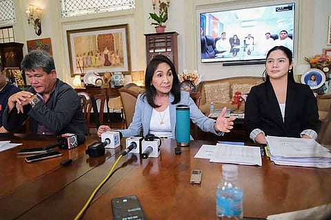 Cebu Gov. Gwendolyn Garcia, accompanied by her lawyers, holds a press conference at the Capitol building in Cebu City on Friday, Sept. 20, 2024, to address various issues.