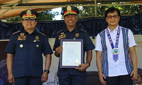 Outgoing Police Regional Office-Davao Region (PRO-Davao)  director Brigadier General Nicolas Torre III (center) shares a photo opportunity with Philippine National Police Chief (PNP) PGen. Rommel Marbil (left), and Secretary of the Interior and Local Government (SILG) Benjamin "Benhur" Abalos, Jr. during the turnover ceremony at the PRO 11 Parade Ground on Friday, September 27, 2024.