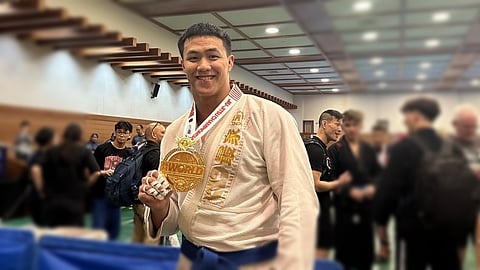 Caption
WORLD JIU-JITSU CHAMPION. Davao City’s Chino Sy Tancontian celebrates his gold medal victory for the Philippines at the 2024 SJJIF World Jiu-Jitsu Championship held over the weekend at the Aichi Budokan in Nagoya, Japan. 