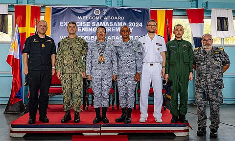 SAMA SAMA 2024. Rear Adm. Todd Cimicata, Commander, Logistics Group Western Pacific/Task Force 73 (COMLOG WESTPAC/CTF 73) (left) poses for a photo with Rear Adm. Jose Ma Ambrosio Q. Ezpeleta, Vice Commander, Philippine Navy, (middle) and Commodore Edward Ike Morada De Sagon, Commander, Naval Forces Northern Luzon (right) at the opening ceremony of Exercise Sama Sama, on Naval Operating Base-Subic, Subic, Zambales, Oct. 7. Sama Sama is a bilateral exercise hosted by the Philippians and the United States, with participants from Australia, Canada, France, and Japan, designed to promote regional security cooperation, maintain and strengthen maritime partnerships, and enhance maritime interoperability.
