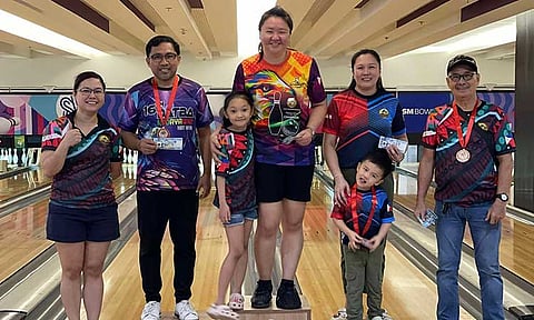 FAB FOUR. Second from left, runner-up Paul Palacio, champion Crystal Chavez, third-placer Ulene Rule, and fourth-placer Paquito Santos celebrate their victories in the recently concluded 
Davao Tenpin Bowlers Association (Datba) monthly finals, held over the weekend at SM Lanang bowling center.