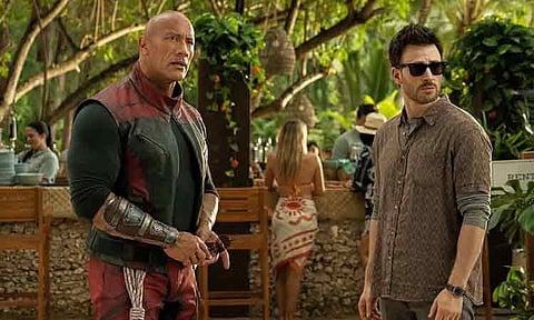 Dwayne Johnson and Chris Evans lead the Christmas action-comedy “Red One,” in cinemas November 6.
