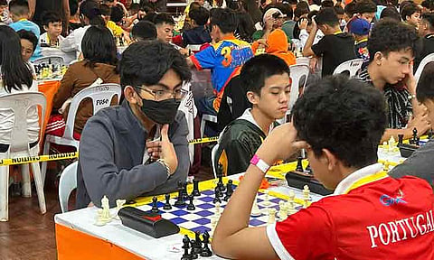 17U CHAMPION. Fide master (FM) Christian Gian Karlo Arca, left, clinches the under-17 title of the Governor Henry S. Oaminal Chess Festival held at the Asenso Misamis Occidental Sports and Cultural Center (AMOSACC) in Oroquieta City, Misamis Occidental. 